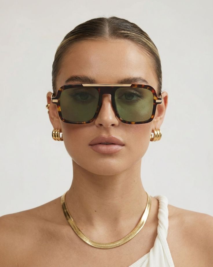 Luxe Tortoiseshell Square Sunglasses - Green lens product shot on stone